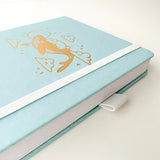 Soft pastel vegan leather bullet journal with delicate gold foil details, made to make your everyday planning feel a little more special ✨

Product Details:

Size: A5 (5.70 x 8.26 inches)
160 Dotted Grid Pages (5 x 5 mm)
2 Bookmarks
Elastic Band and Pen Holder
Expandable storage compartment