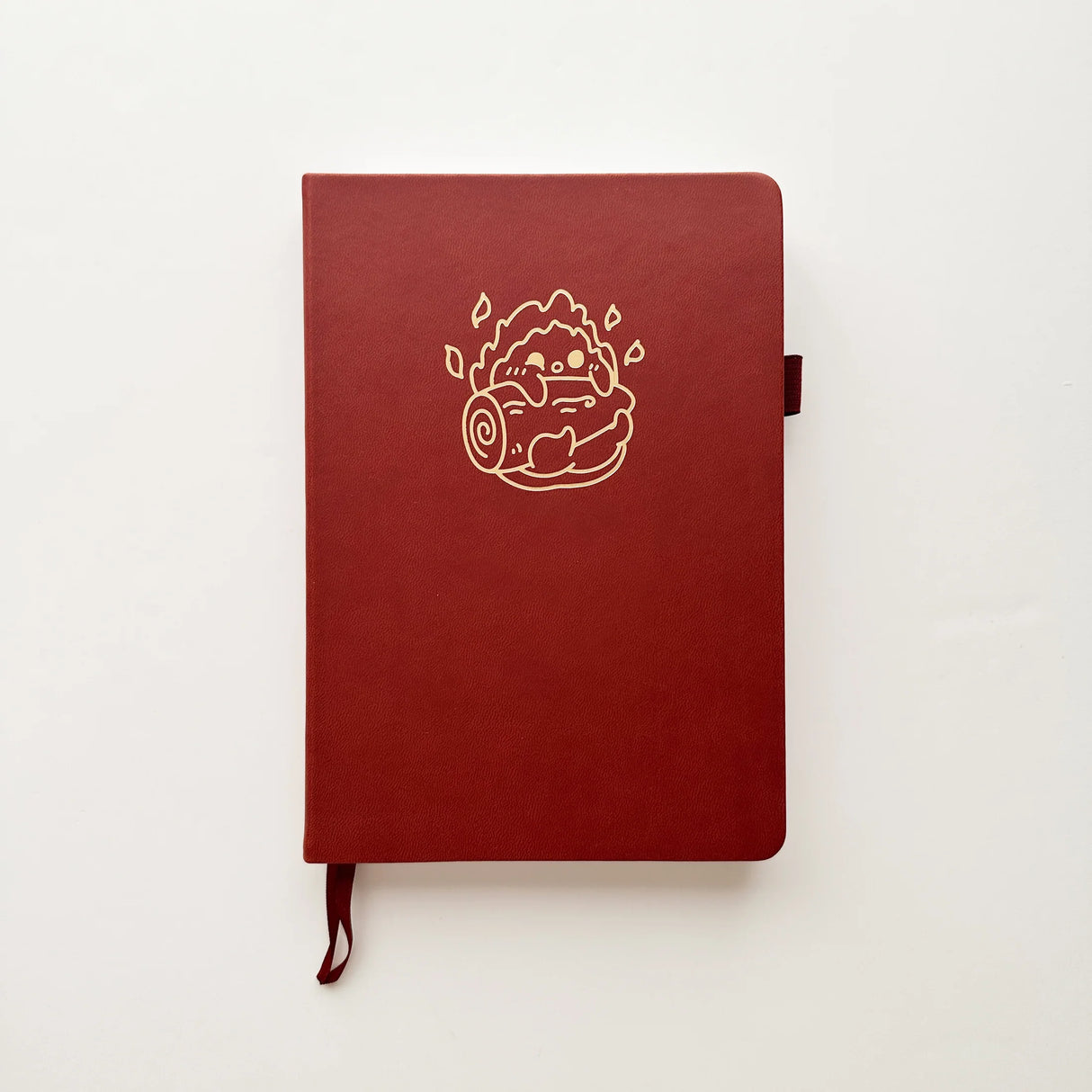 Fire Spirit Journal in a beautiful, rich dark terracotta colour🔥with Gold Foil Logo✨

Product Details:

Size: A5 (5.70 x 8.26 inches)
160 Dotted Grid Pages (5 x 5 mm)
2 Bookmarks
Elastic Band and Pen Holder
Expandable storage compartment