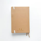 Milk Tea Journal in a beautiful, rich boba colour 🧋 with Gold Foil Logo ✨

Product Details:

Size: A5 (5.70 x 8.26 inches)
160 Dotted Grid Pages (5 x 5 mm)
2 Bookmarks
Elastic Band and Pen Holder
Expandable storage compartment
