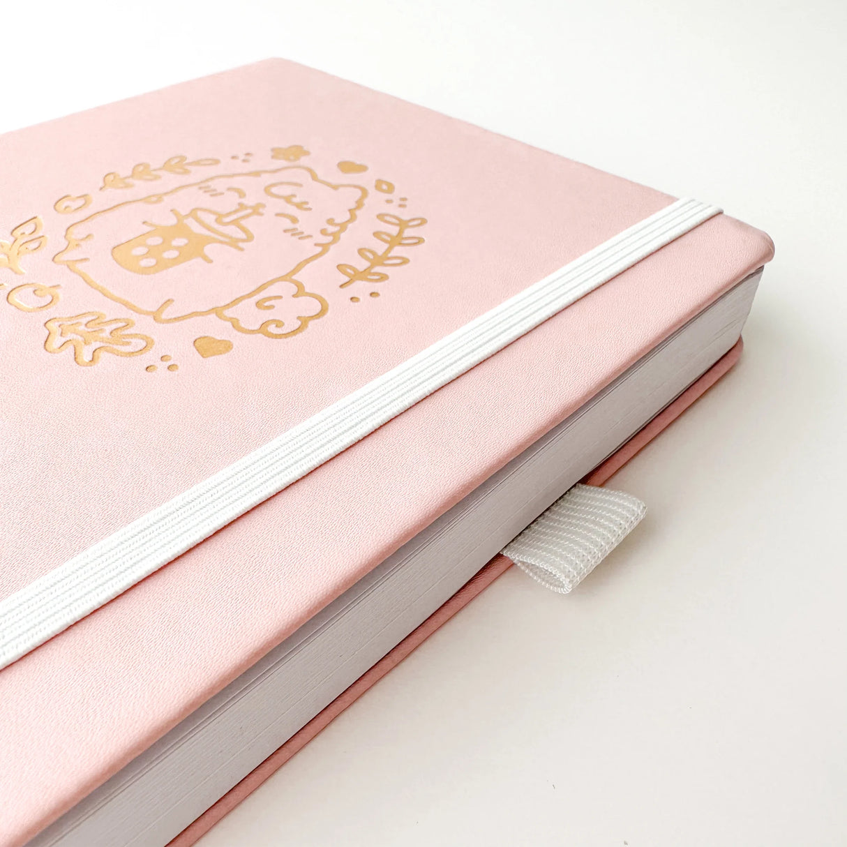 Soft pastel vegan leather bullet journal with delicate gold foil details, made to make your everyday planning feel a little more special ✨

Product Details:

Size: A5 (5.70 x 8.26 inches)
160 Dotted Grid Pages (5 x 5 mm)
2 Bookmarks
Elastic Band and Pen Holder
Expandable storage compartment