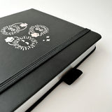 Soot Spirits Journal with Holographic Edges and Logo! ✨

Product Details:

Size: A5 (5.70 x 8.26 inches)
160 Dotted Grid Pages (5 x 5 mm)
2 Bookmarks
Elastic Band and Pen Holder
Expandable storage compartment