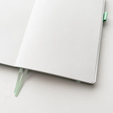 Bunny Spirit Journal in Sage Green with Gold Foil Logo🌱

Product Details:

Size: A5 (5.70 x 8.26 inches)
160 Dotted Grid Pages (5 x 5 mm)
2 Bookmarks
Elastic Band and Pen Holder
Expandable storage compartment