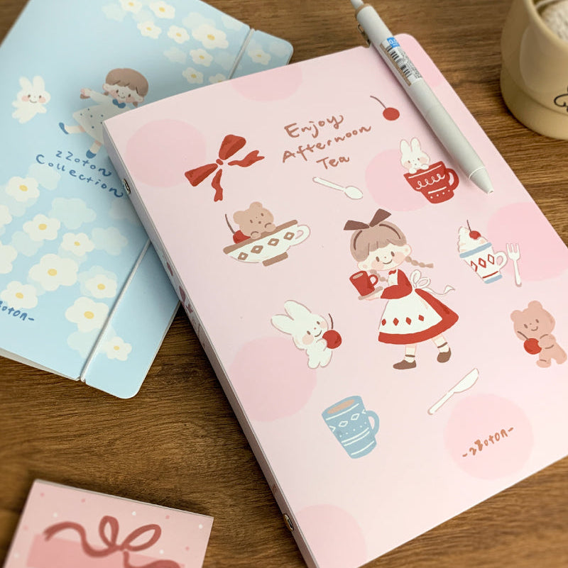 Molinta A5 Organizing Binder - Afternoon Tea

Designed in a six‑ring format, this binder is perfect for organizing ephemera, sticker sheets, journaling inserts, and creative plans. This&nbsp;A5 binder, gives you plenty of room to store larger pages, decorative layouts, and all the bits and pieces that make your journaling uniquely yours. Whether you're building sticker albums, creating themed spreads, or keeping your notes tidy, this binder offers a beautiful and functional way to keep everything in one pla