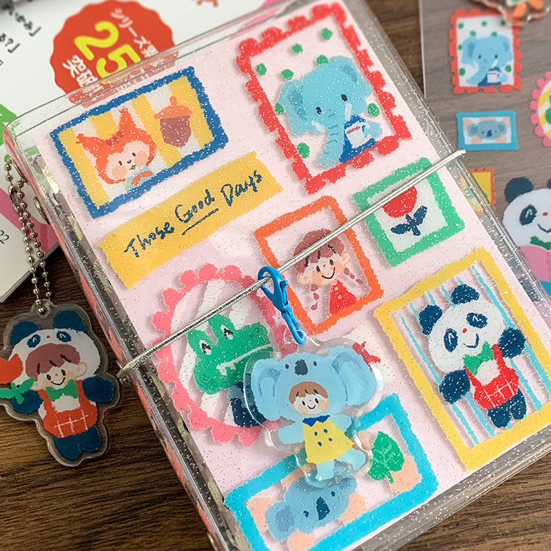 Molinta Binder - Crayon Animal

Add sparkle and sweetness to your planning routine with the Crayon Animal Binder, featuring a glitter‑covered finish that makes every journaling moment feel extra magical. This compact binder blends Molinta’s signature crayon‑style animal artwork with fun, tactile shimmer — perfect for anyone who loves cute stationery with personality.&nbsp;An&nbsp;elastic closure keeps your pages secure, while the adorable panda costume keychain adds a playful finishing touch that makes this