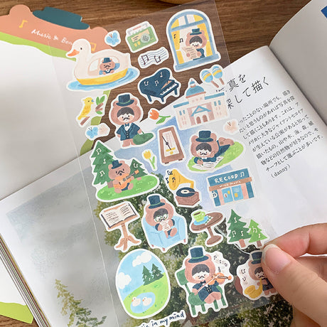 Featuring an adorable collection of music and bear themed illustrations, this sticker sheet adds a warm, whimsical touch to planners, cards, photo albums, and creative projects. Each design is printed on durable writing paper with vibrant colors for easy decoration!