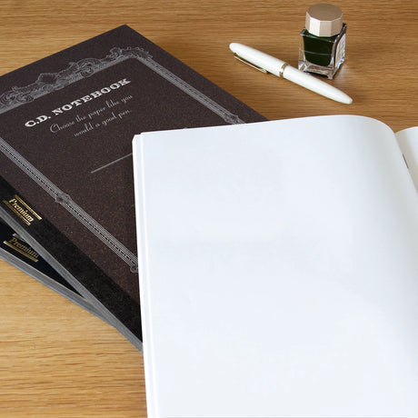 High-quality notebooks are ideal for jotting down ideas, taking notes, sketching, making lists and more. They are perfect for use at home or the office.&nbsp;


Contains silky white, acid free paper that allows for effortless writing.
Notebooks available in ruled, grid and plain paper options.
Heavy duty covers feature a glitter accent.
Silver and gold foil text on the cover also decorate this upscale notebook.
Sturdy thread binding allows the notebook to lay flat for comfortable writing.
Red threading matc