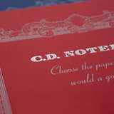 High-quality notebooks are ideal for jotting down ideas, taking notes, sketching, making lists and more. They are perfect for use at home or the office.&nbsp;


Contains silky white, acid free paper that allows for effortless writing.
Notebooks available in ruled, grid and plain paper options.
Heavy duty covers feature a glitter accent.
Silver and gold foil text on the cover also decorate this upscale notebook.
Sturdy thread binding allows the notebook to lay flat for comfortable writing.
Red threading matc