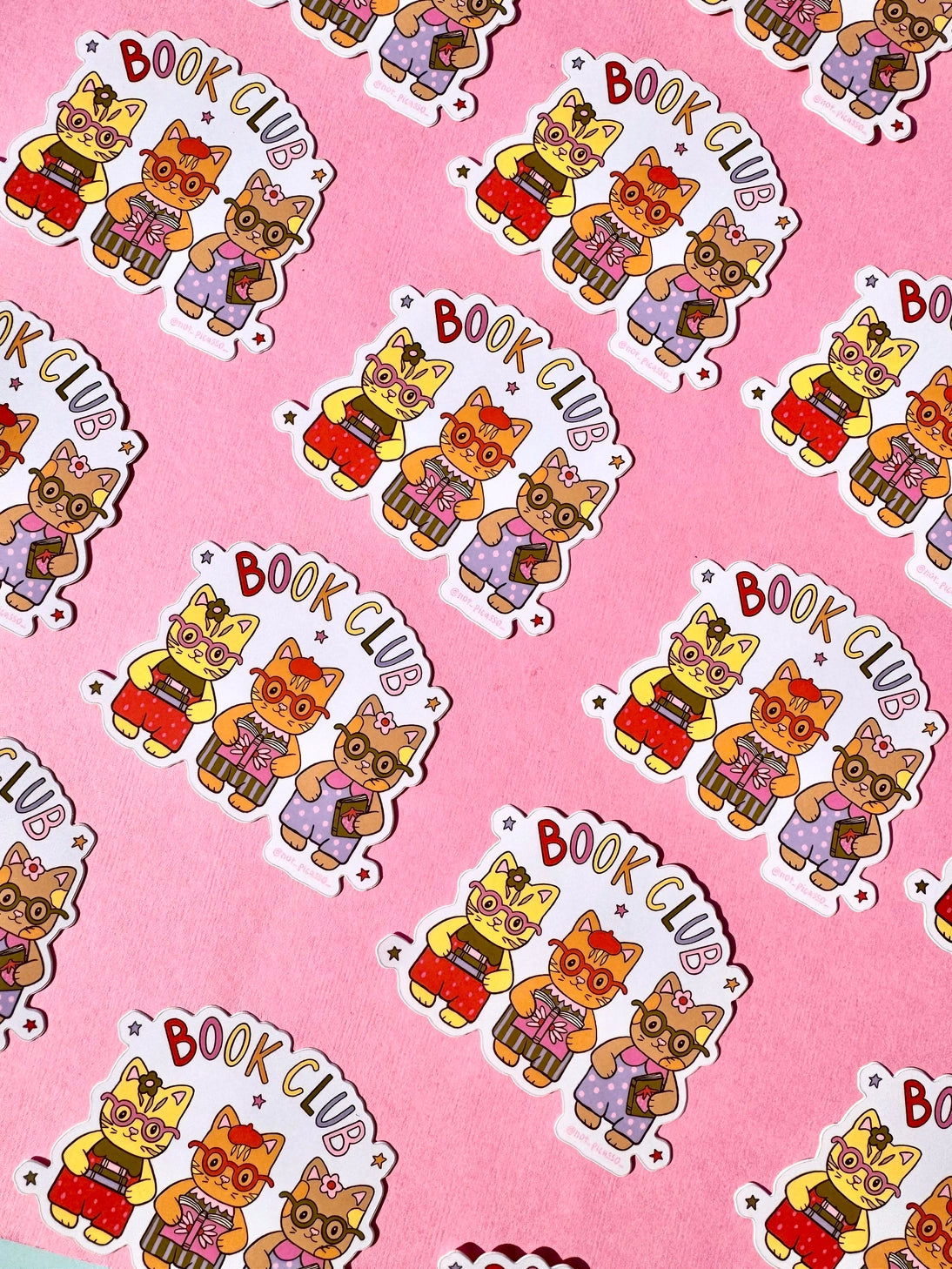 These adorable book themed stickers are perfect for sharing with your book club friends. It features 3 adorable cats with their favorite reads!

These matte vinyl stickers feature an original design and are water, weather, and scratch proof. Perfect for putting on water bottles, computers or just about anywhere else.