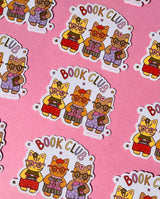 These adorable book themed stickers are perfect for sharing with your book club friends. It features 3 adorable cats with their favorite reads!

These matte vinyl stickers feature an original design and are water, weather, and scratch proof. Perfect for putting on water bottles, computers or just about anywhere else.