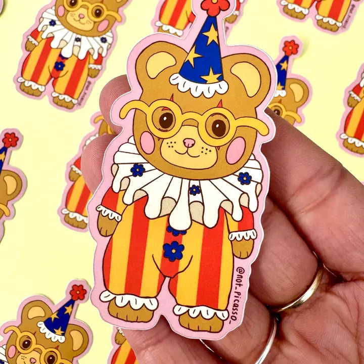 These adorable stickers feature a cute little bear in a clown suit.

These matte vinyl stickers feature an original design and are water, weather, and scratch proof. Perfect for putting on water bottles, computers or just about anywhere else.