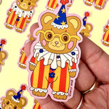 These adorable stickers feature a cute little bear in a clown suit.

These matte vinyl stickers feature an original design and are water, weather, and scratch proof. Perfect for putting on water bottles, computers or just about anywhere else.