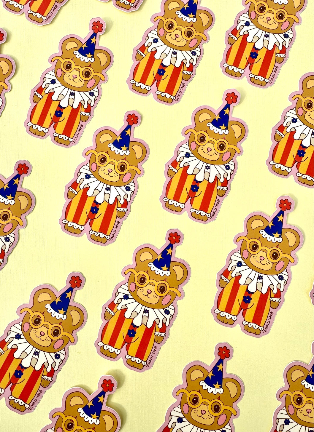 These adorable stickers feature a cute little bear in a clown suit.

These matte vinyl stickers feature an original design and are water, weather, and scratch proof. Perfect for putting on water bottles, computers or just about anywhere else.