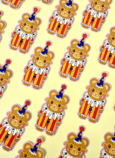 These adorable stickers feature a cute little bear in a clown suit.

These matte vinyl stickers feature an original design and are water, weather, and scratch proof. Perfect for putting on water bottles, computers or just about anywhere else.