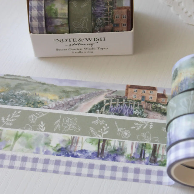 This beautiful washi tape gift set is designed for journalers, nature lovers and stationery lovers who find beauty in the quiet corners of the British countryside. Featuring original watercolour paintings by Rebecca, this set is inspired by walks through a bluebell wood and a secret garden in full bloom.&nbsp;

The two designs included:

Bluebell Woods — a hand-painted watercolour scene of a bluebell wood - 15mm x 5m
Secret Garden — a beautiful cottage and garden scene, hand-painted in soft watercolours - 2
