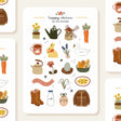 A matte paper sticker sheet filled with cozy, hand-drawn illustrations, perfect for planners, journals, or scrapbooking. It features a cozy spring and hygge season theme, making it a perfect fit for mindful living enthusiasts. All designs are lovingly created by Monika Szczerbińska.