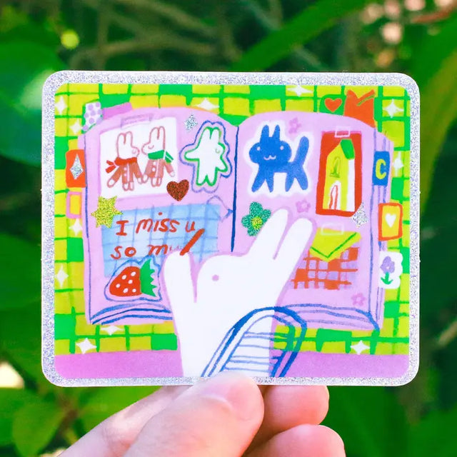 Glitter vinyl sticker, 3 inches on the longest side.

PET laminate with UV screening to protect from sunlight and weather, 2-4 year outdoor life. PVC free product. Weather and water resistant.