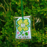 2x2.5 omamori charm with a 8 inch string.

An omamori is a Japanese charm that provides protection and luck!