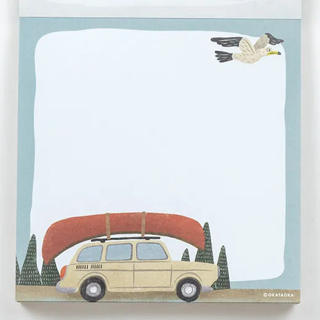 Okataoka Hello Mellow Memo Pad - Active Illustration of a car with a canoe on top, surrounded by trees and a bird, on a light blue background.