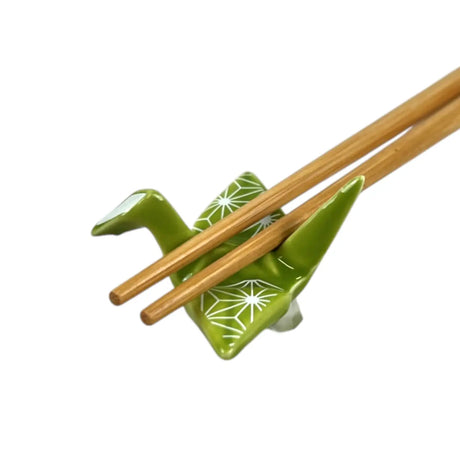 These cute ceramic rests are a perfect stationery addition to your desk! Use them for pens, paint brushes, or take them to your kitchen as a chopstick rest!

Size:2"L
Material: Porcelain
Weight: 1.6 oz
Origin: China