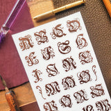 STICKII - Ornate Alphabet Sticker Sheet

✒️📜 Add a touch of old-world elegance to your pages with this ornate alphabet sheet. Inspired by gothic lettering, vintage monograms, and illuminated manuscript details, each letter is full of curling flourishes and antique charm. Perfect for spelling out initials, decorating journal pages, labeling letters, or giving any paper project the feeling of something pulled from a beautifully aged book.

Top Coating: None
Adhesive Layer: Paper
Backing Layer: Paper
6.69" x 