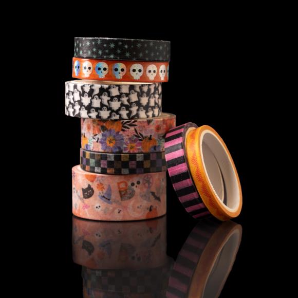 Add a touch of spooktacular charm to your creative projects with the Washi Tape from the Tricks And Treats Collection by Paige Evans for American Crafts.

This package includes eight rolls of tape featuring a variety of designs, such as pink and black stripes, skulls, ghosts, and more.

The rolls range in width from 0.375" to 0.875" and each measures six yards in length, giving you a total of 48 yards of tape to play with.

Whether you're decorating cards, scrapbook pages, envelopes, tags, journals, planner