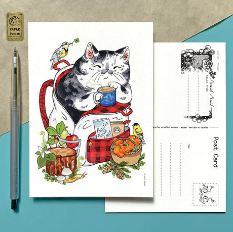 A happy camping cat, there are bits representing Oregon and Washington such as Meadowlark and Goldfinch birds, the iconic banana slug, trillium flowers and chanterelles, Douglas Fir... can you spot them all?

+ size: 4.25 x 6” standard size, regular postage stamp
+ printed on a ‘toothy’ rag off white color card stock paper
+ FSC 100% recycled environmentally friendly paper
+ created and printed in Portland, OR 


All work and photos ©PAPER PUFFIN Art by K.CARLSON