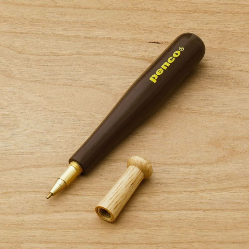 A wooden baseball bat pen by Penco. The bat handle acts as the cap, and the pen tip is made of brass.

Comes in black oil-based ink with 0.8mm tip.&nbsp;