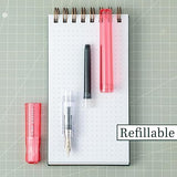 Kakuno is a delightful, new fountain pen that is ideal for both first time fountain pen users and experienced writers. Everyone can enjoy writing with a Kakuno fountain pen. "Kakuno" means "to write" in Japanese, and that's just what this pen helps users to do by featuring an appealing smiley face on the nib, when oriented upward, ensures perfect nib orientation. The NEW Kakuno Clear body features the Extra Fine, Fine and Medium Nib (with a tongue sticking out). Indentations in the cap make it easy to grasp