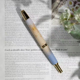 To commemorate 36 years of Kin Chi, this exclusive Pilot Capless “Starry Dawn” captures the quiet magic of the moment when night begins to surrender to morning.

Its softly layered colors move from pale blue through warm golden yellow and into a vivid morning blue, echoing the changing sky just before sunrise. Against the clouds, a radiant golden sun emerges while a scattering of stars still lingers above—an in-between moment where night and day meet.