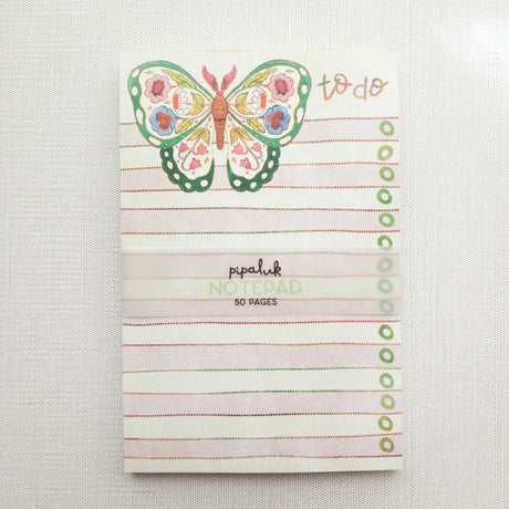 In the gardens of Wildflower Woods, a butterfly drifts from bloom to bloom, wings patterned with flowers gathered along the way. This notepad brings that light, floral moment to your desk, making everyday lists feel a little more inviting.

Designed to be practical without feeling busy, this notepad offers a simple, cheerful way to keep track of daily to-do lists and planning.