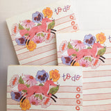 In a quiet clearing of Wildflower Woods, a fox moves through blooming flowers, petals lifting gently as he passes beneath open sky. This notepad brings that playful, woodland moment to your desk, making everyday lists feel a little more inviting.

Designed to be practical without feeling busy, this notepad offers a simple, cheerful way to keep track of daily to-do lists and planning.