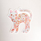A calm cat returns from the blooming meadows of Wildflower Woods, patterned with flowers gathered along the way. This vinyl sticker captures that quiet, reflective moment, carrying a simple reminder to let yourself bloom.

Made from durable, waterproof vinyl, this sticker is designed to hold up wherever you place it—whether that’s a water bottle, laptop, or journal you reach for daily.
