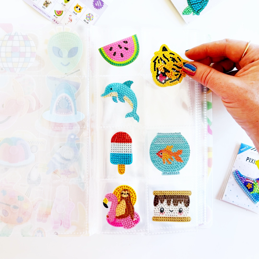 This perfectly portable keeper is made to hold your Pixigems in one neat, peekable place so they’re ready whenever inspiration strikes. Toss it in your tote, stash it in your backpack, or keep it on your desk for instant sparkle access. No more loose gems rolling around. No more “where did that one go?!” moments.