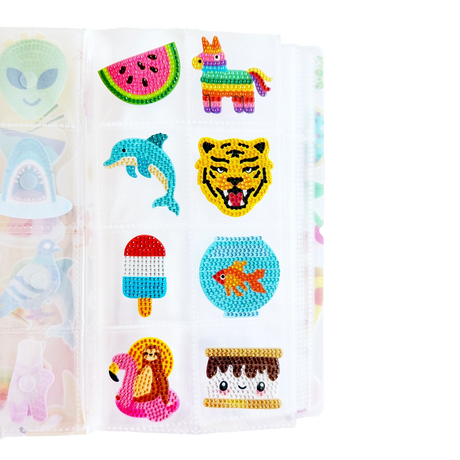 This perfectly portable keeper is made to hold your Pixigems in one neat, peekable place so they’re ready whenever inspiration strikes. Toss it in your tote, stash it in your backpack, or keep it on your desk for instant sparkle access. No more loose gems rolling around. No more “where did that one go?!” moments.