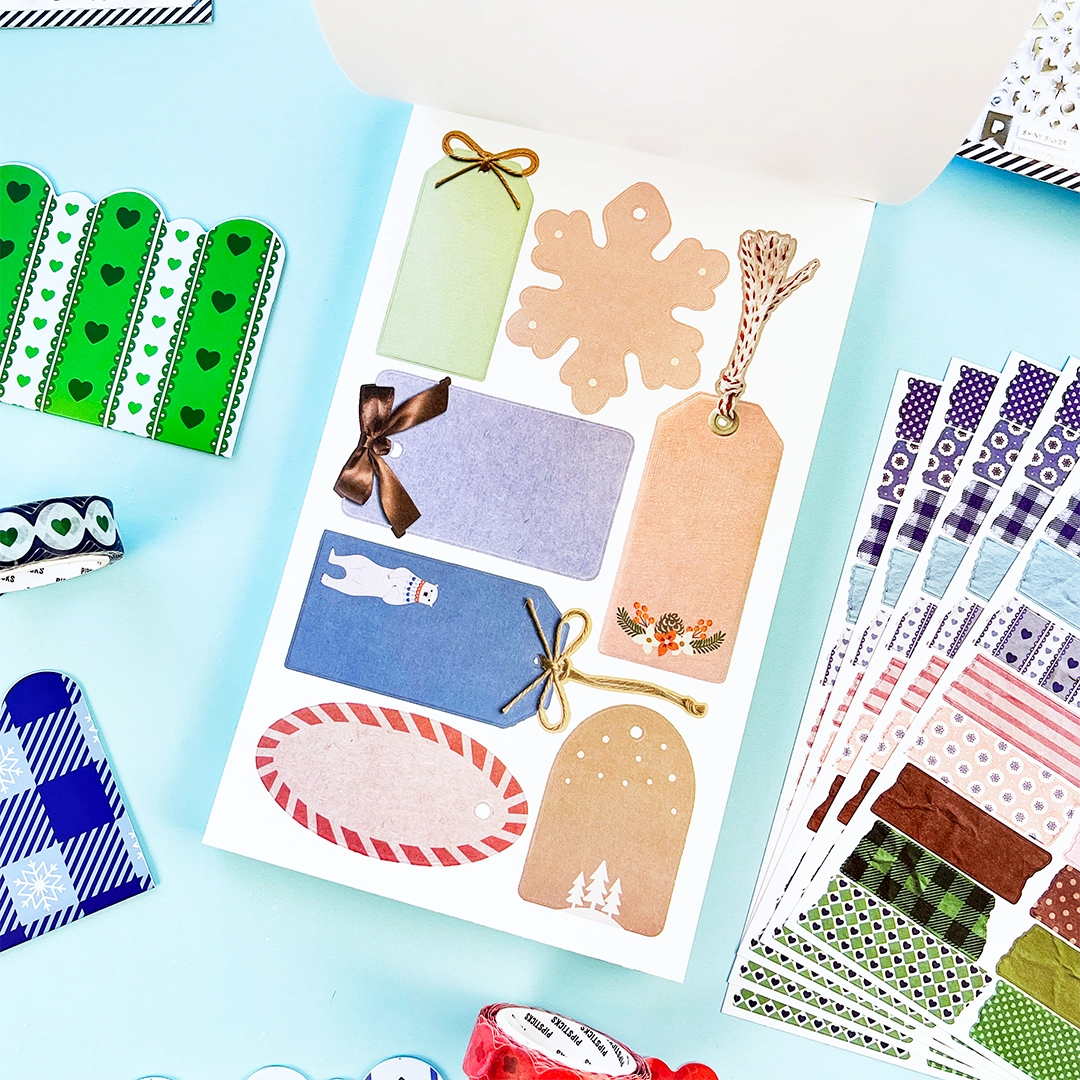 You asked, we delivered! Introducing our new Winter inspired Junk Journal sticker book! With Frames, borders, patterns and alphabets you'll be able to document every moment of your life with whimsy and delight! Perfect to junk journal, collage, and scrapbook your way through the season. 