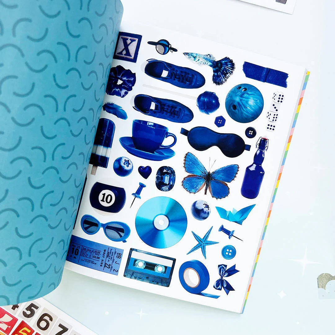Your sticker stash is about to get very color-coordinated 🌈 Sticker the Rainbow Book Vol. 2: In Real Life is packed with 1500+ photorealistic stickers in every shade imaginable, from juicy lemons and shiny silver treasures to butterflies, vintage objects, florals, gems, and colorful everyday finds. With 30 pages of ultra-realistic stickers (plus 4 pages of alphabet + number stickers!), this book is basically a rainbow treasure hunt for your journal, planner, snail mail, laptop, or craft cart.