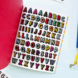 Your sticker stash is about to get very color-coordinated 🌈 Sticker the Rainbow Book Vol. 2: In Real Life is packed with 1500+ photorealistic stickers in every shade imaginable, from juicy lemons and shiny silver treasures to butterflies, vintage objects, florals, gems, and colorful everyday finds. With 30 pages of ultra-realistic stickers (plus 4 pages of alphabet + number stickers!), this book is basically a rainbow treasure hunt for your journal, planner, snail mail, laptop, or craft cart.