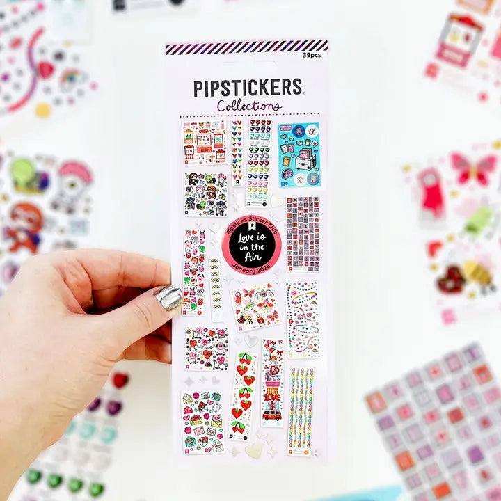 LIMITED EDITION COLLECTIBLE!

PipStickers are the PERFECT gift for the sticker lover in your life - even if it's you! These unique PVC designs with holographic silver foil accents come on a clear backing and cannot be found anywhere else.

Includes one 3" x 7" sheet of Kids Collections Vol 1: Love is in the Air PipStickers and includes the Pipsticks manifesto.