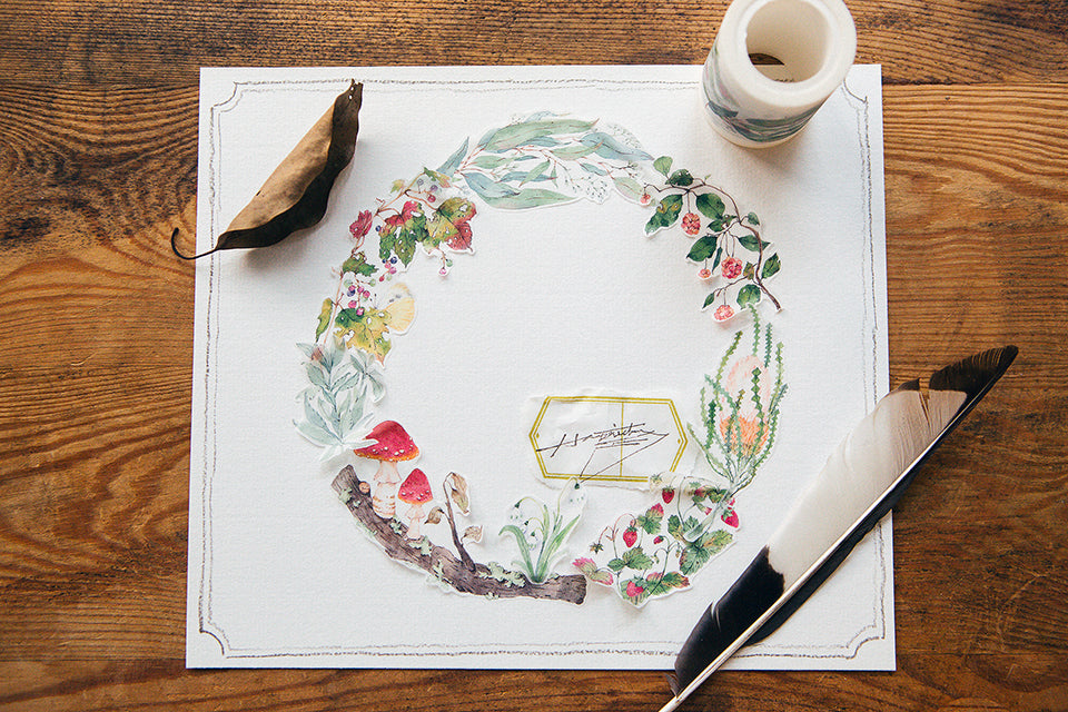 Plant some white sage, gather forest berries, and admire branches covered in gray-green lichen and wild mushrooms. Capturing the forest vibe of spring and summer is this Wild Wreath 2 Washi Tape.