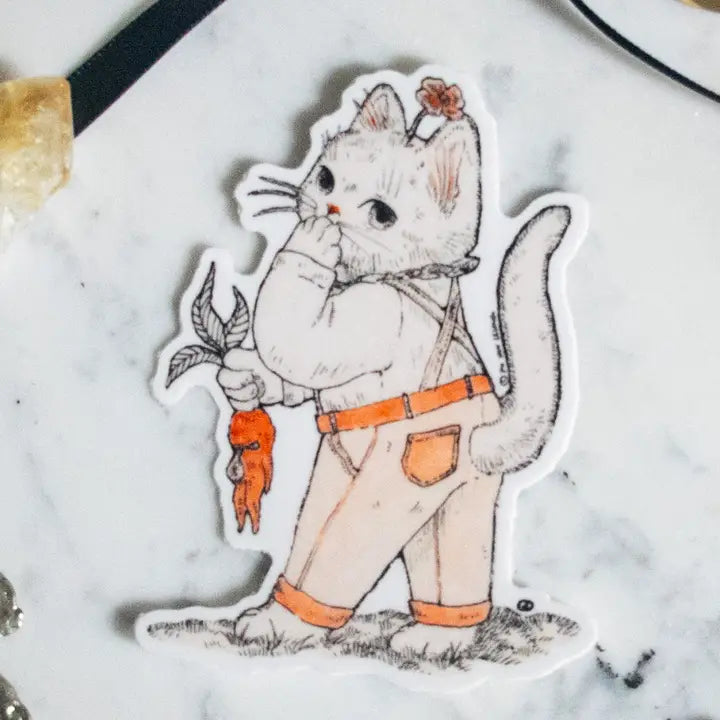 This sweet little kitty has found themself in a bit of a garden mishap. Illustrated in a whimsical pen-and-ink style with a soft vintage touch, “Oops Kitty” brings charm and a smile wherever it goes. Printed on durable white vinyl, this sticker is waterproof, UV-proof, and long-lasting — perfect for decorating water bottles, laptops, journals, or anywhere a touch of magic is needed.