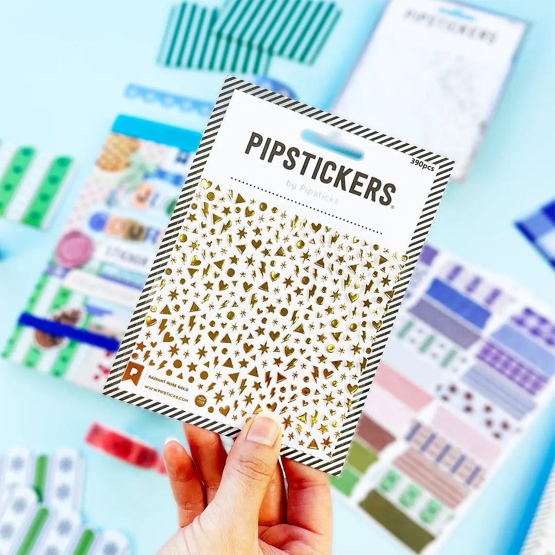 Mini stickers in the most DREAMY rose gold foil adorn this PipSticker sheet. With more than 350 tiny stickers you can add a little (or a lot!) of sparkle magic on everything you touch! Perfect for journaling, crafting, and adding some shimmery touches to all your mail and projects! 

Includes one 4" x 4" sheet of Radiant Rose Gold PipStickers with 390 individual stickers. 