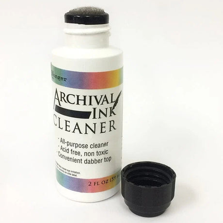 Archival Ink Cleaner easily cleans water-based, permanent, pigment, and solvent inks. The specially formulated non-toxic cleaner is safe for use on rubber and clear stamps and Ranger's Non-Stick Craft Sheet. Available in a 2oz dabber top bottle.