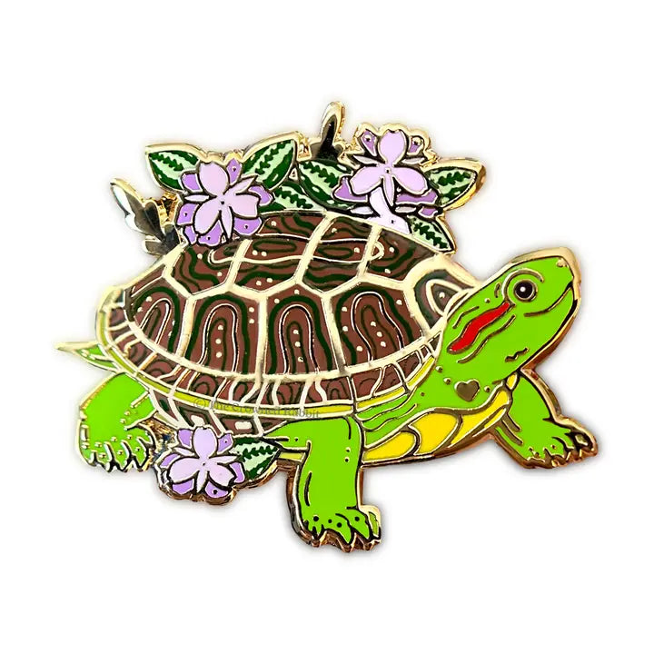 Celebrate your love for turtles!

✦ Hard enamel
✦ Shiny gold metal
✦ 2 inches
✦ 2 Posts for extra security
✦ Rubber backings
✦ Back stamped for authenticity

Comes packaged on a backing card.