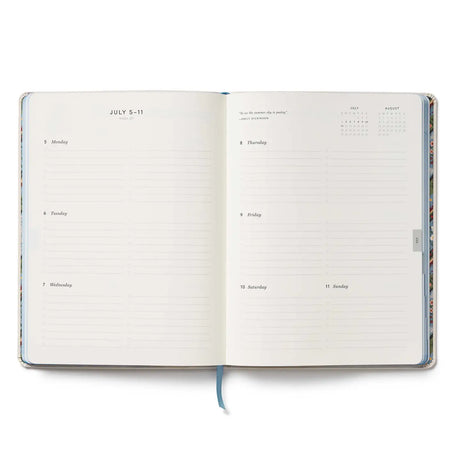 A daily essential with keepsake quality. With a cover inspired by classic cross stitch samplers, this fabric-wrapped planner features gold foil details, weekly and monthly views, space for notes and to-dos, and a list of celebrations.&nbsp;

DETAILS

Printed in full color with foil stamped year
Book cloth cover with ivory uncoated paper
Natural white text paper interior
January 2027-December 2027
Monthly and weekly views
Space for notes each week
List of celebrations
7.18" W x 9.62" L