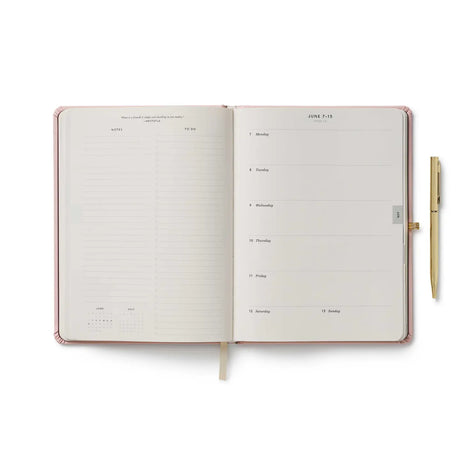 Spanning January 2027 to December 2027, this hardcover planner is framed in our charming Paisley print with a foil-stamped year, and an elastic closure. In addition to weekly and monthly views, the interior includes space for weekly notes and to-dos, a list of celebrations, a pocket folder for storage, and a gold pen.

DETAILS

Printed in full color with foil stamped year
Book cloth wrapped hardboard cover
January 2027-December 2027
Monthly and weekly views
Space for notes and to-dos each week
List of celeb
