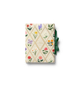 A prettier stationery stash, perfect for writing on the go. Printed with Garden Study florals in six individual designs, this folio-style set includes 12 notecards (two of each design) with matching envelopes, tucked inside a coordinating folder with a ribbon-tie closure.
