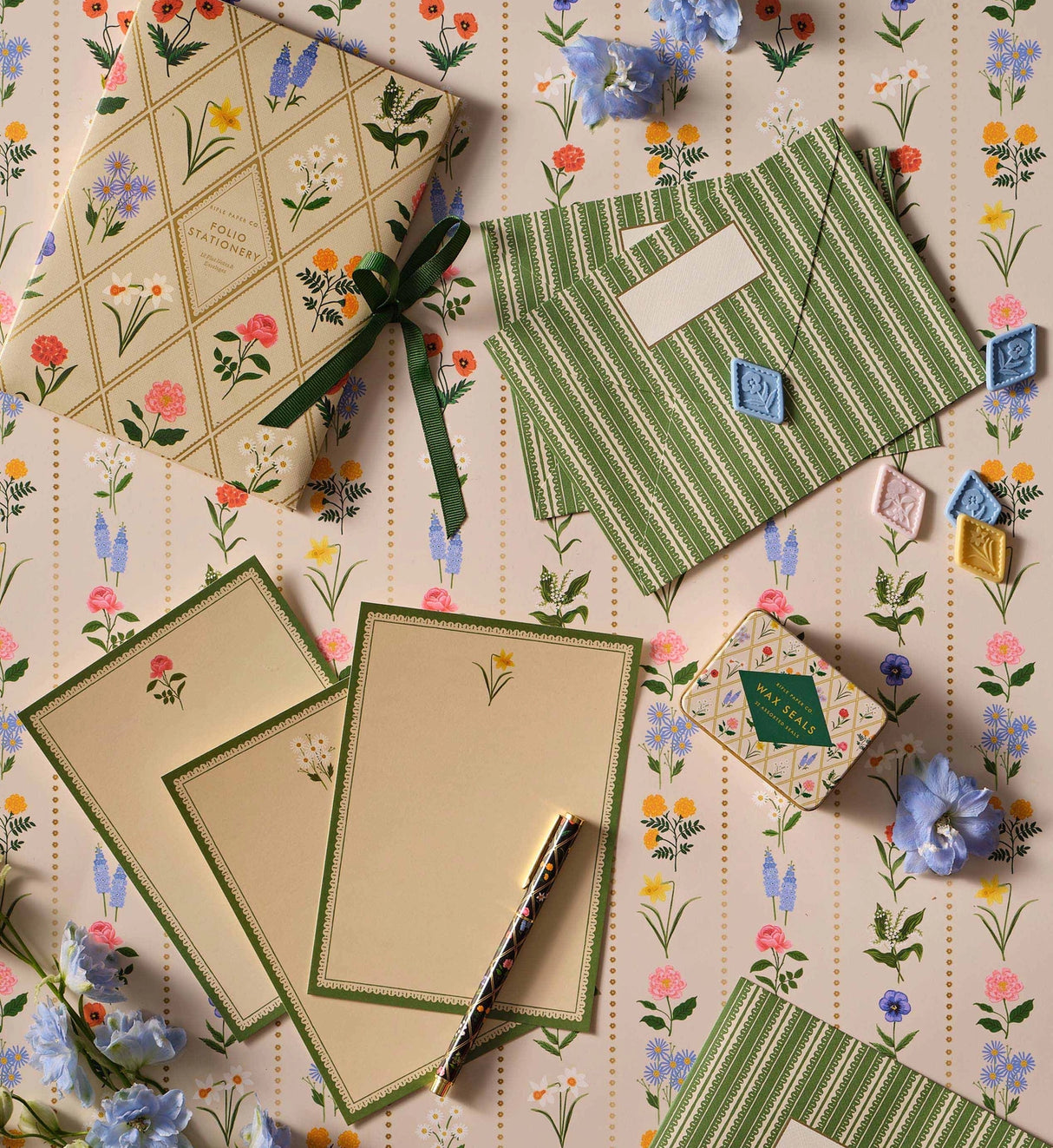 A prettier stationery stash, perfect for writing on the go. Printed with Garden Study florals in six individual designs, this folio-style set includes 12 notecards (two of each design) with matching envelopes, tucked inside a coordinating folder with a ribbon-tie closure.