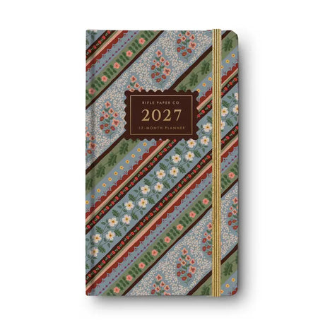 Great things come in small formats. The smallest planner in our lineup, our pocket planner features a hard, fabric-wrapped cover, monthly and bi-weekly page views, sections for important dates, and notes.

DETAILS

Printed in full color with foil stamped year
Book cloth cover with white text paper interior
January 2027-December 2027
Monthly and bi-weekly page views
Sections for important dates and notes
Illustrated interior pockets for storage
Fabric wrapped hardboard
Gold elastic band
3.8" W x 6.375" L