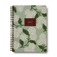 Our softcover spiral planner features a canvas paper cover printed with Hydrangea florals and a gold foil year. Inside you’ll find monthly and weekly views, plenty of space for notes, a list of celebrations, and pockets for storage.&nbsp;

DETAILS

Printed in full color with foil stamped year
Canvas paper cover with white text paper interior
January 2027-December 2027
Monthly and weekly views
Space for notes each week
List of celebrations
Pockets for storage
Spiral bound

6.25" W x 8.5" L