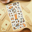 🥐☕️ Spend a cozy day at the bakery with this charming sheet, where fresh loaves, sweet treats, and warm cups of coffee await! From mixing batter and rolling dough to sneaking a quiet break with something delicious, it’s all about the simple joys of baking.&nbsp;

Top Coating: None
Adhesive Layer: PVC (plastic)
Backing Layer: Clear PET
6.69" x 3.54".
Weight - 0.03lbs.
1 sheet included &nbsp; &nbsp;